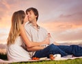 Attractive couple kissing on romantic picnic Royalty Free Stock Photo