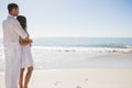 Attractive couple looking out at sea Royalty Free Stock Photo