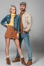 attractive couple posing in autumn outfit for fashion shoot Royalty Free Stock Photo