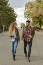 Young couple walking in the city park Royalty Free Stock Photo