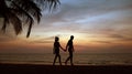 Attractive couple relaxing and walking on a tropical beach Royalty Free Stock Photo