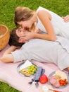 Attractive couple on romantic afternoon picnic kissing Royalty Free Stock Photo