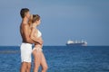 Attractive couple at the sea Royalty Free Stock Photo