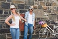 Attractive couple standing with bikes Royalty Free Stock Photo