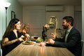 Attractive couple talking during a fancy dinner Royalty Free Stock Photo