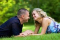 Attractive couple together on meadow Royalty Free Stock Photo