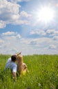 Attractive couple together on meadow Royalty Free Stock Photo