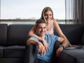 Attractive Couple Using A Laptop on couch Royalty Free Stock Photo