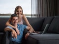 Attractive Couple Using A Laptop on couch Royalty Free Stock Photo