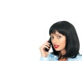 Attractive Dark Haired Young Woman Using a Mobile Cell or Chordless Telephone Royalty Free Stock Photo