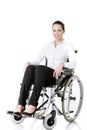 Attractive disabled businesswoman sitting in a wheel chair Royalty Free Stock Photo