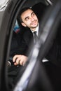 Attractive elegant happy man drive good car Royalty Free Stock Photo