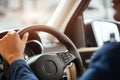 Elegant happy man in good new car in sale centre Royalty Free Stock Photo