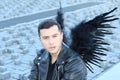 Attractive ethereal ethnic man with wings