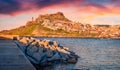 Attractive evening cityscape of Castelsardo port. Splendid sunset on Sardinia island