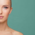 Attractive face of beautiful girl. Close-up portrait of healthy woman. Skin care, cosmetics, makeup, complexion and face Royalty Free Stock Photo