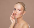 Attractive face of beautiful girl. Close-up portrait of healthy woman. Skin care, cosmetics, makeup, complexion and face Royalty Free Stock Photo