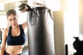 Attractive female boxer training with kick boxing at gym with blackgloves Royalty Free Stock Photo