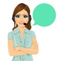 Attractive female customer support phone operator with arms folded and speech bubble Royalty Free Stock Photo