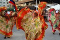 Spectacular Colombian dancers waving motley skirts street performance
