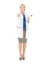 Attractive female doctor pointing her finger
