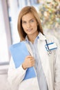 Attractive female doctor smiling Royalty Free Stock Photo