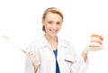 Attractive female doctor with toothbrush and jaws Royalty Free Stock Photo