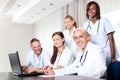 Attractive female doctor working on her laptop Royalty Free Stock Photo