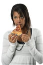 Attractive female eating pizza