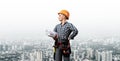 Attractive female engineer in hardhat Royalty Free Stock Photo