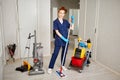 Floor care and cleaning services with vacuume cleaner at hotel room