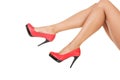 Attractive female legs in red high heels. Royalty Free Stock Photo
