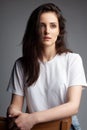 Attractive female model four thirds view in blank white t-shirt