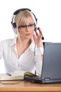 Attractive female operator with headset working