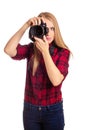 Attractive female photographer holding a professional camera - i