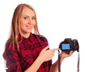 Attractive female photographer showing screen of camera - isola