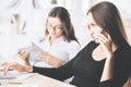 Attractive females talking on phone Royalty Free Stock Photo