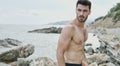 Attractive athletic young man at the beach Royalty Free Stock Photo