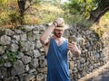 Handsome male farmer outdoor with cell phone Royalty Free Stock Photo