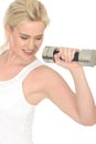 Attractive Fit Healthy Determined Young Woman Working Out with Dumb Bell Weights Royalty Free Stock Photo