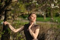 attractive girl in the green  spring forest Royalty Free Stock Photo