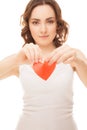 Attractive girl holding broken paper red valentine heart focus o Royalty Free Stock Photo