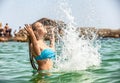 Attractive girl laying in sea Royalty Free Stock Photo