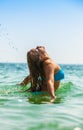 Attractive girl laying in sea Royalty Free Stock Photo