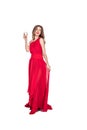 attractive girl posing in red chiffon dress with champagne glass Royalty Free Stock Photo