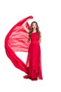 attractive girl posing in red chiffon dress with veil Royalty Free Stock Photo