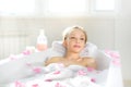 Attractive girl relaxing in bath Royalty Free Stock Photo