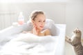 Attractive girl relaxing in bath Royalty Free Stock Photo