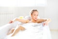 Attractive girl relaxing in bath Royalty Free Stock Photo