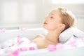 An Attractive girl relaxing in bath Royalty Free Stock Photo